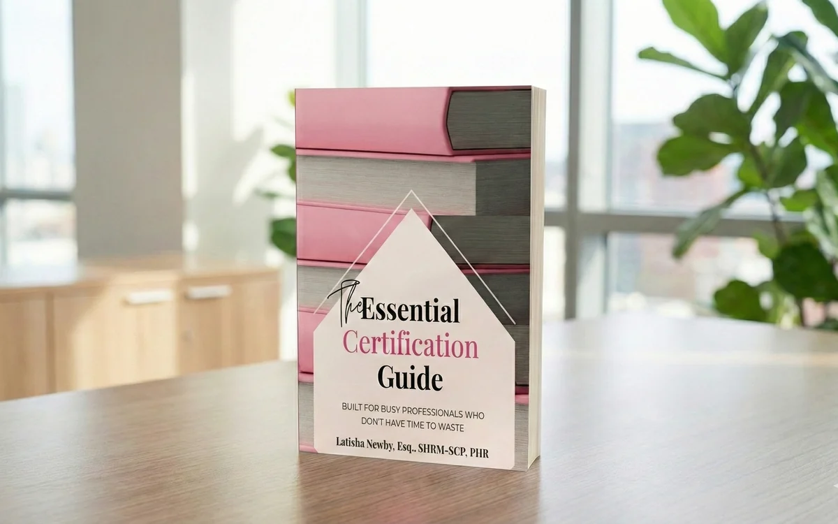 The guide in paperback, standing on a desk.